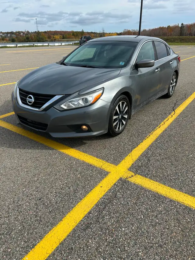 2018 Nissan Altima. New MVI. Average kms. Comes with snow tires