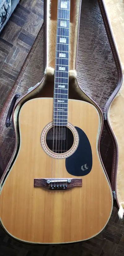 Acoustic guitar with hardshell case, View more