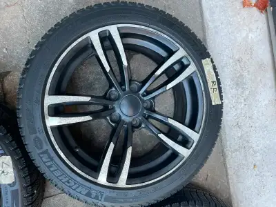 Available is a set of Michelin X-Ice 3 winter tires mounted on aftermarket alloy wheels, previously...