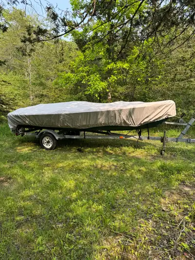 Boat trailer for sale. Comes with a 16’ boat with an electric motor (torpedo) that is currently not...