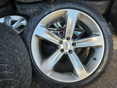 Set of 4 original 20" dodge charger/challenger rims with winter tires on them 245/45/R20. Rims and t...