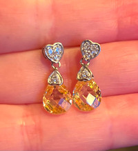 Sterling silver earrings with yellow crystal stone