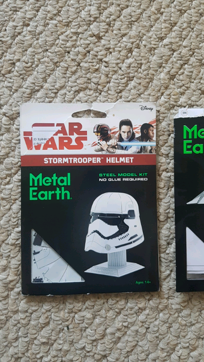 Both of these are opened, but only the Nighthawk was started. The Storm Trooper helmet is still in i...