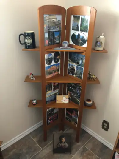 Tall photo stand with shelves, View more