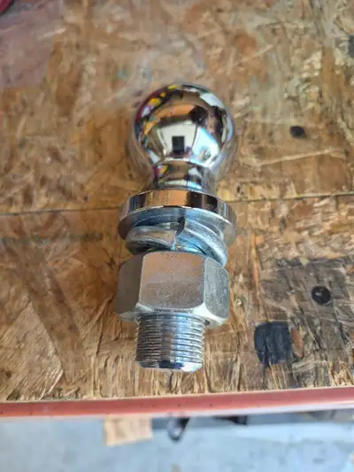 This is a brand new 2-inch diameter trailer hitch ball, perfectly suited to handle your towing needs...
