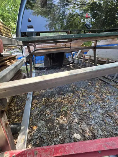 This aluminum back rack is a sturdy solution for truck bed organization, as can be seen in the photo...