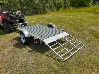 Brand new galvanized 4 x 6 utility trailer, manufactured by DK2 out of Burlington, Model MMT4X6OG. 2...
