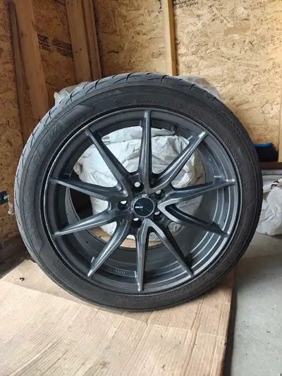 94W speed rating 300 tread wear, tons of tread left wheels are in good condition, lightly used but s...