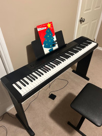 Piano full size 88 weighted keys &accessories in great condition