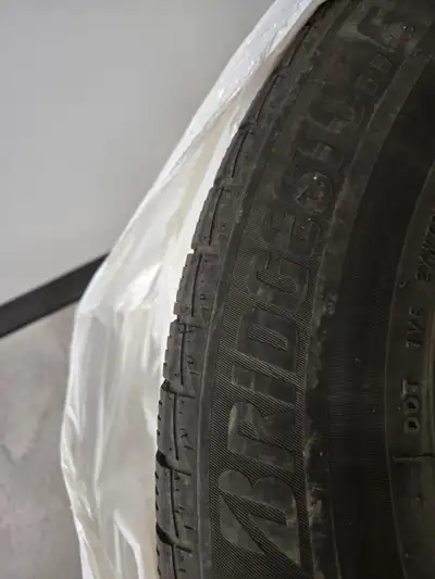 Used tires in good condition, not on rims, were installed on Dodge Grand Caravan.