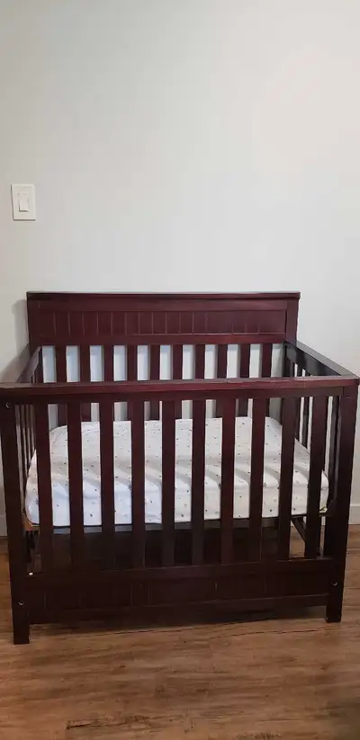 Mini baby crib mattress included plus three crib mattress sheets. Used for near 1 year still in good...