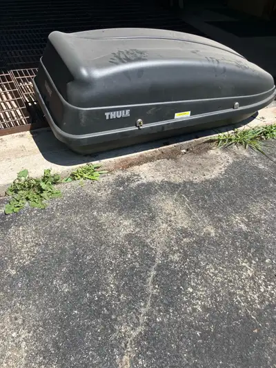 Thule roof top cargo carrier, it was purchased a couple years ago but has never been used, new was o...