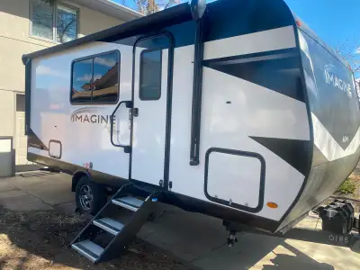 Well cared for light weight family trailer shows like new. The queen Murphy bed converts into a sofa...