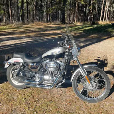 8562Km! 100th anniversary edition. silver, black Bike runs perfect and sounds real nice. Mint shape....