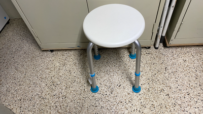 Shower or Bathtub stool, round top, adjustable height. purchased from Congdon's Aids To Daily Living...
