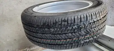 I'm selling a brand new Bridgestone tire mounted on a rim, size 215 55 R17, never been driven on. Th...