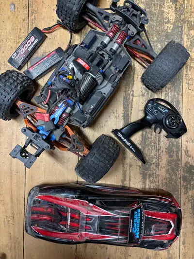 2 rc cars for sale or trade Arrma big rock 4x4 3s- in good condition, needs driveshaft installed, th...