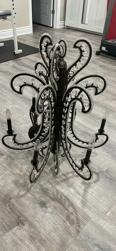- Beautiful chandelier; body of it is 32.5” tall, 28” wide and it comes with 70” of wiring. - Metal...
