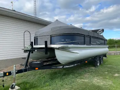 Premier Gemini 221 is a highly versatile 22-foot pontoon renowned for its spacious "rear-fish" layou...