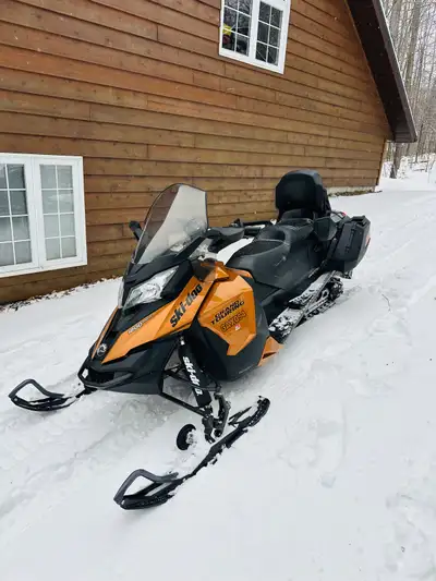 Excellent condition, 4 stroke, always garage stored, ski wheels, ice scratchers, hard saddle bags, r...