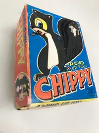 A WIND UP TOY CHIPPY -vintage 