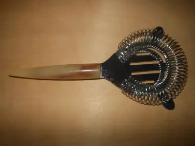 Cocktail strainer with Bakelite handle, View more