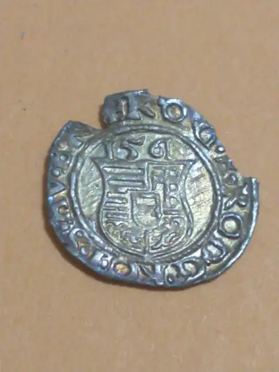 Uncleaned, lovely toning. Clipped for use as fractional payment. #2018-0139 in HB2. Obverse, coat of...