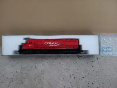 N scale Kato SD locomotive with MicroTrains couplers added. DC. Shipping available. If ad is up it's...