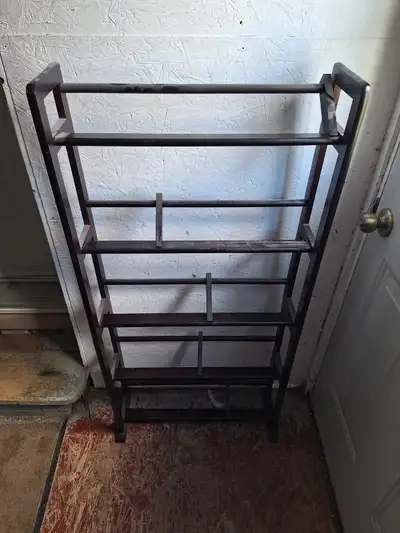 Shelf designed for CD's, DVD's and Video games, but could be used for books as well. Has sliding boo...