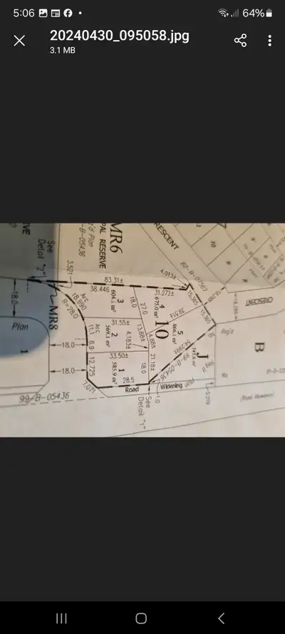 Lot 4 adjacent to the park on Corrigal Crescent in the Turtle Lake Lodge division of The Resort Vill...
