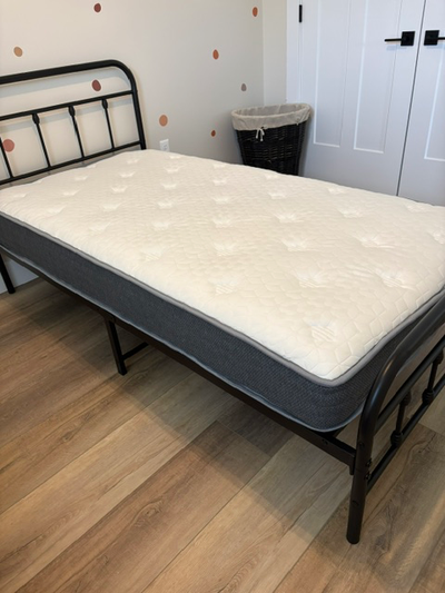 Twin Bed with never used mattress, View more