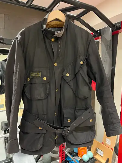 Men’s size large Barbour Corbridge motorcycle jacket. Waxed cotton with brass buttons and a tartan i...