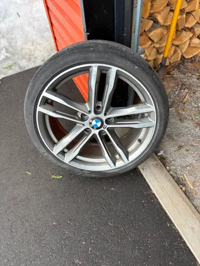 4 - BMW rims with run flat tires and wheel caps, 5 x 120 bolt pattern, rear are 225/40/19 Goodyear,...