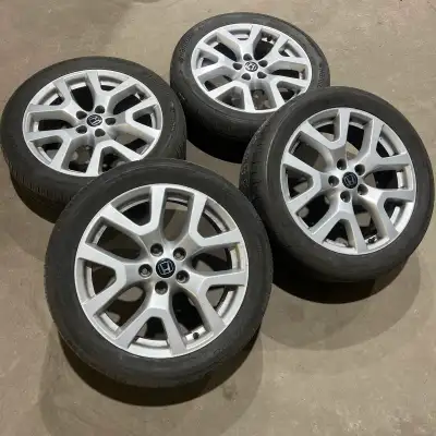 Set of four aftermarket aluminum alloy rims with 235/45/18 Hankook Ventus all season tires. Tires ha...