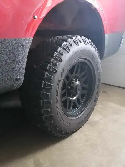 Goodyear Wrangler 285/70/17 on Envy 17"x8.5" rims. 5x135 Ford wheels off of my 2002 F150. Tires are...
