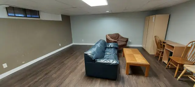 Large basement bedroom suite located in upper Sahali south shore