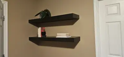 Two heavy floating shelves in a good condition. May require additional bracket reassembly as seen on...