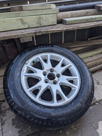 A set of 4 Volvo alloy rims with tires