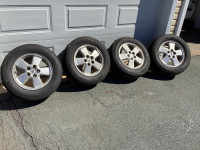 For sale: Four 225 65 16 all season tires on Escape rims
