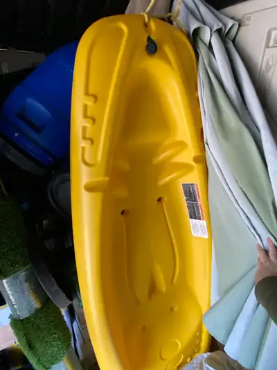 This is a used Pelican child’s sit-on-top kayak, perfect for getting your little one out on the wate...