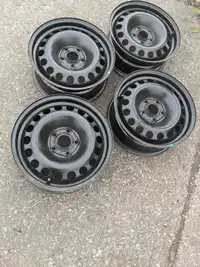 Set of 4 used like new steel wheels GM fit 2012-2016 Sonic 