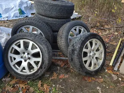 Like New. Used for 2 months last winter. Winter Tires with Rims. Came off a range rover 255/50R19