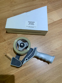 48mm Hand Tape Gun with a roll of tape