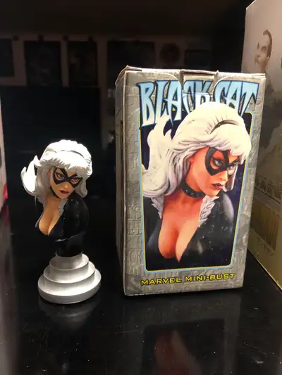 Looking at a 2002 Bowen Designs Marvel Black Cat mini bust statue numbered 3903/6000. Statue is in e...