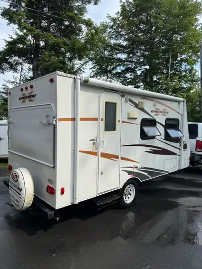 2011 hybrid trailer. Needs work. Floor is bad through half of it, roof had been leaking, but I will...