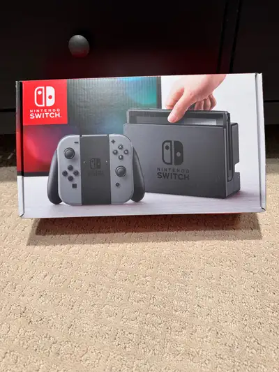 Nintendo Switch Console Comes with box and all accessories Factory Reset and Ready For New User.