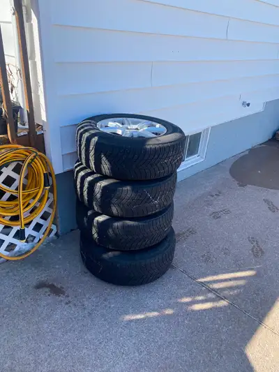 Michelin X-Ice Tires and rims 235/65/17 off a Audi q5