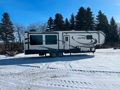 Selling 2015 Keystone 5th wheel camper. Excellent shape. Meticulously maintained. 4 slides. Lots of...