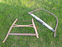 Two vintage hand saws (one metal, one wood frame)