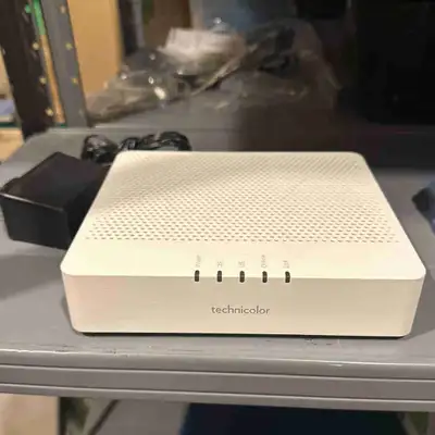 This Technicolor modem is perfect for cable internet, offering reliable connectivity. It is in good...